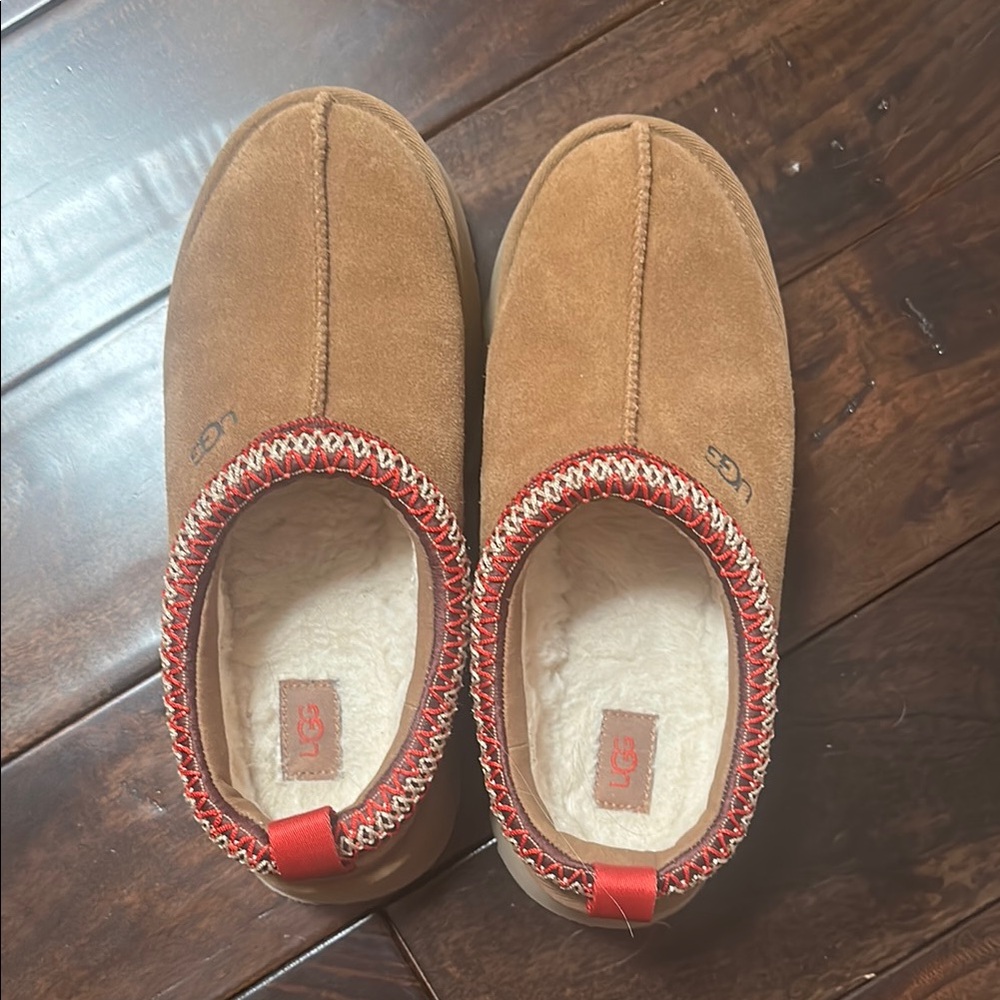 UGG Women’s Brown Suede Slip-Ons with Red Trim